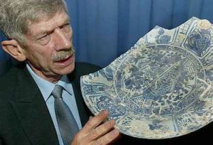 Image: Sjostrand with one of the artefacts that is being exhibited."