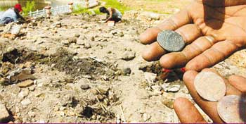 Image: Portuguese and Dutch era coins that Raffiee Mohd Najeer and his friends have dug up."